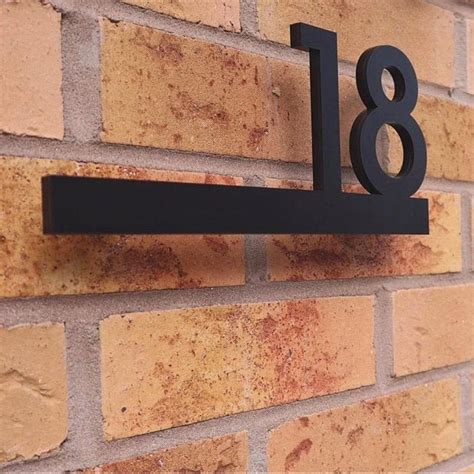 house numbers metal black on brick wall|house numbers for exterior design.